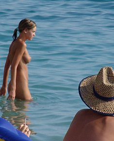 beautiful young nudists enjoys being naked near beach resort jamaica