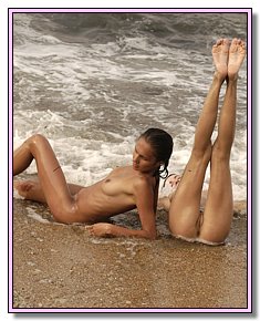 nice-looking teenage nudists lie sunbathing naked at florida nude beaches